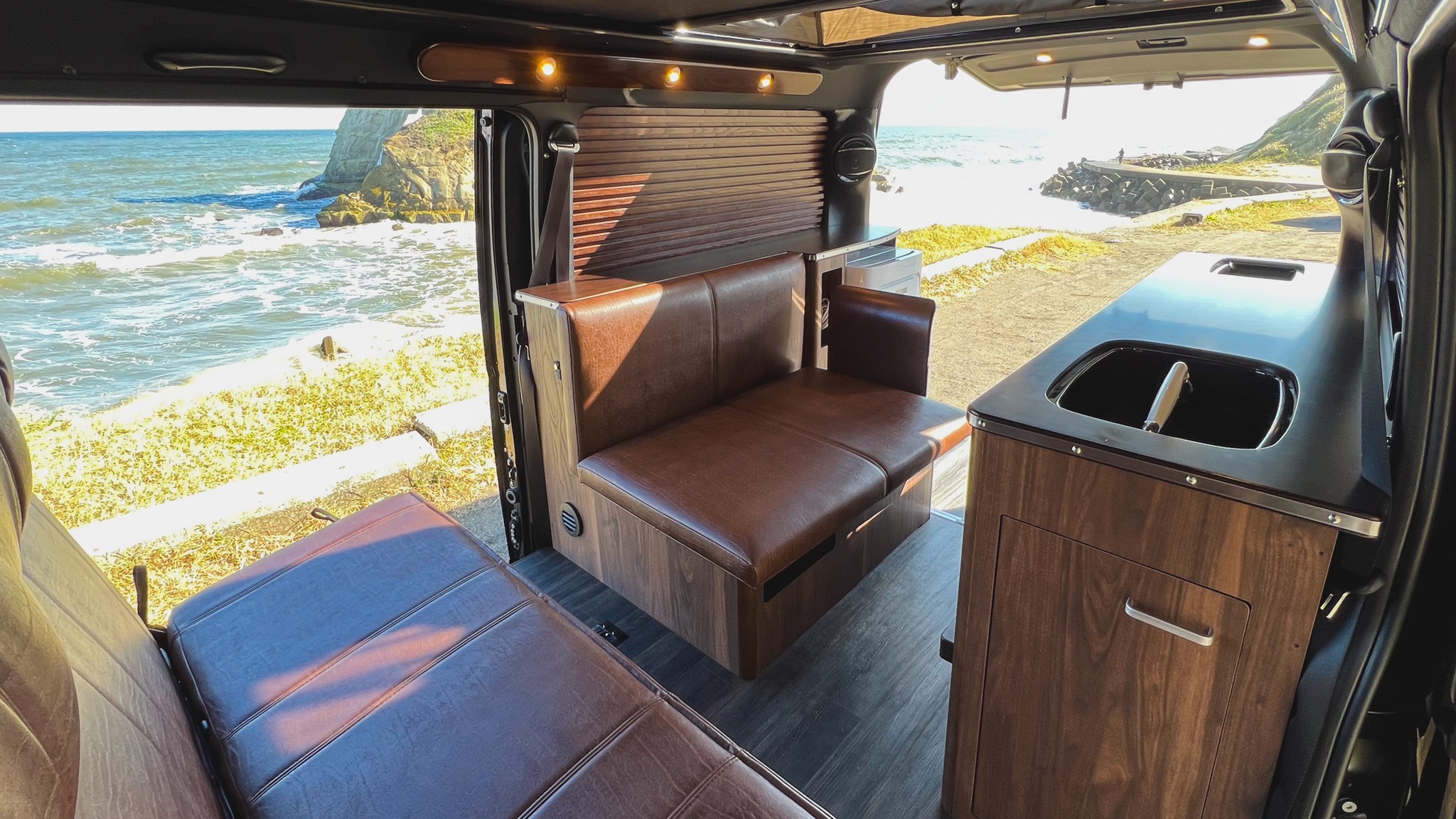 🌊 Room with a view - Van life edition

Living spaces that open to adventure! Our custom Hiace layout features:
- Comfortable leather seating that converts to a bed
- Panoramic views from every angle
- Ambient lighting
- Premium wood finishes
- Pop-up roof for added space and ventilation

The perfect balance of comfort and mobility. Park anywhere, and your living room instantly becomes the best seat in the house 🚐

Where would you take your home on wheels?

#3rdPlaceCamper #VanLife #CamperVanInterior #VanBuilding #RoadTrip #BeachLife #キャンピングカー #車中泊 #バンライフ #海岸キャンプ